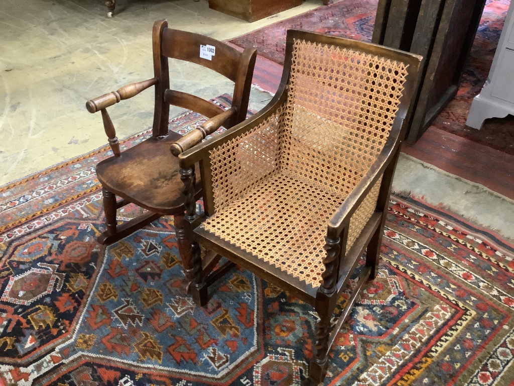 A Victorian mahogany child's rocking chair, height 60cm and a 1920's child's caned armchair, height 64cm